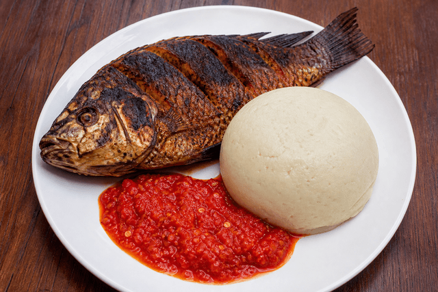 Photorealistic Banku with tilapia menu-main food image by VDAMO