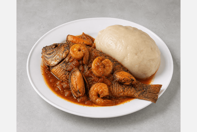 Photorealistic Banku with tilapia menu-main p05 food image by VDAMO