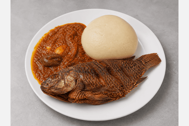 Photorealistic Banku with tilapia menu-main p07 food image by VDAMO