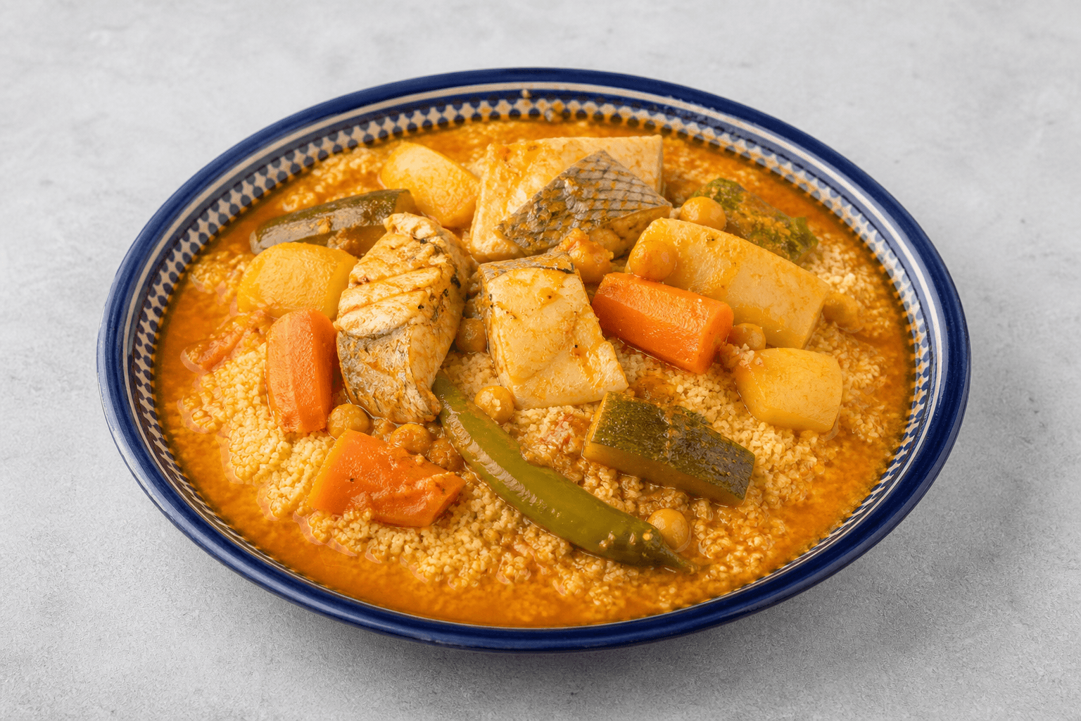Photorealistic Tunisian fish couscous menu-main p02 food image by VDAMO