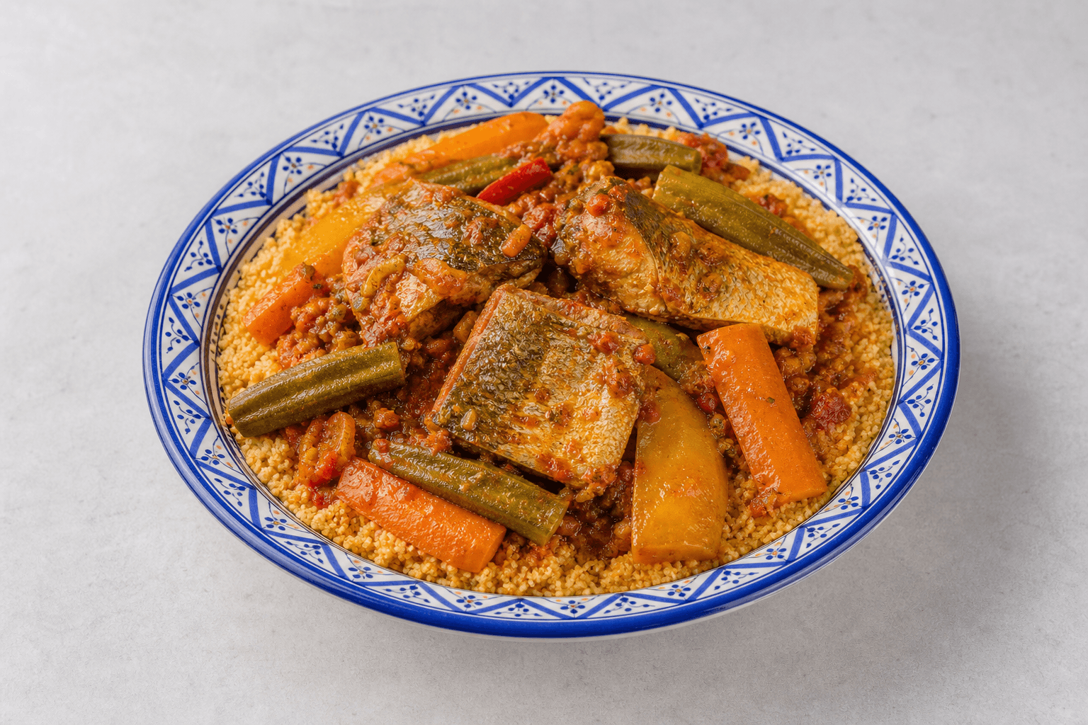 Photorealistic Tunisian fish couscous menu-main p04 food image by VDAMO