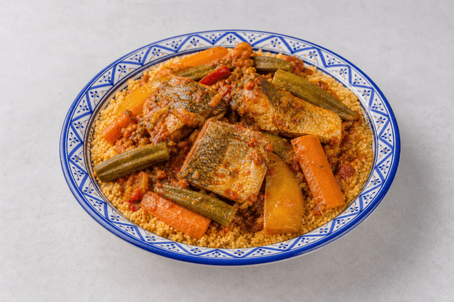 Photorealistic Tunisian fish couscous menu-main p04 food image by VDAMO