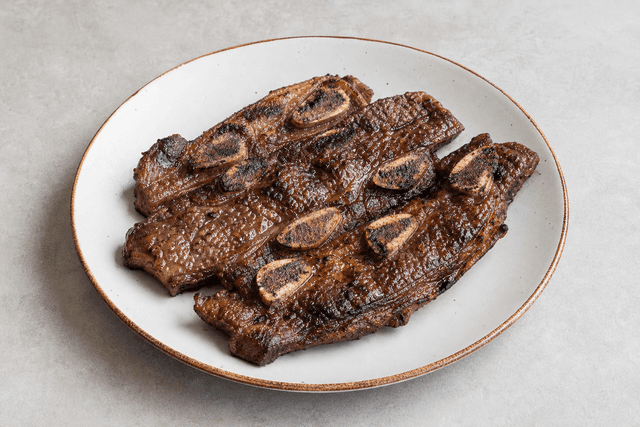 Photorealistic Asado de tira menu-main p07 food image by VDAMO