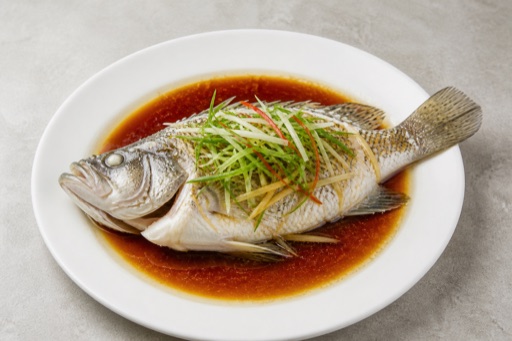 Steamed fish with soy sauce food image by VDAMO