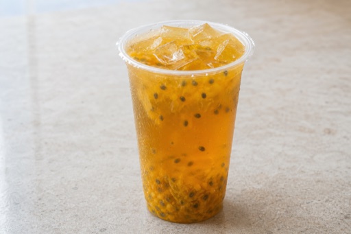 Photorealistic passion fruit duck shit aroma oolong fresh fruit tea P02 food image by VDAMO