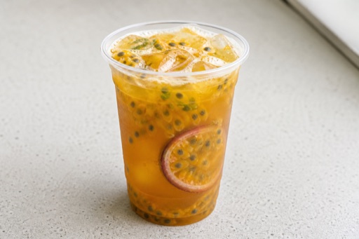 Photorealistic passion fruit duck shit aroma oolong fresh fruit tea P06 food image by VDAMO
